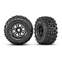 TRAXXAS Tires & wheels, assembled, glued (black wheels, dual profile (2.8" outer, 3.6" inner), Sledgehammer® tires, foam inserts) (2) (17mm splined) (